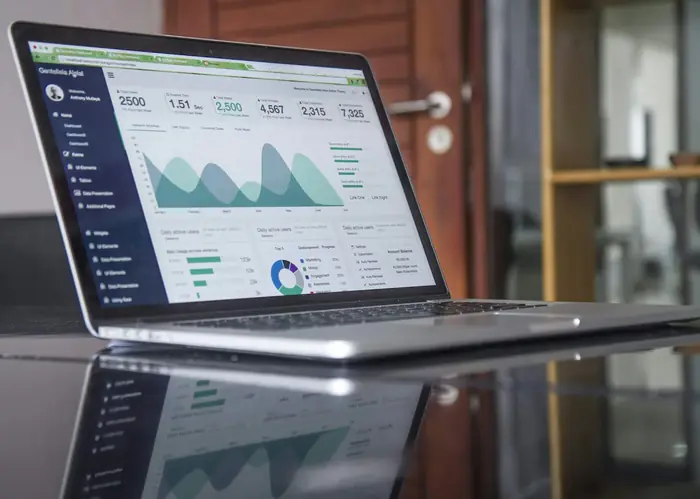 Laptop with a sales analytics dashboard