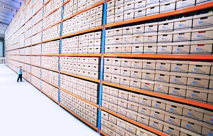 Long aisle of labeled storage racks